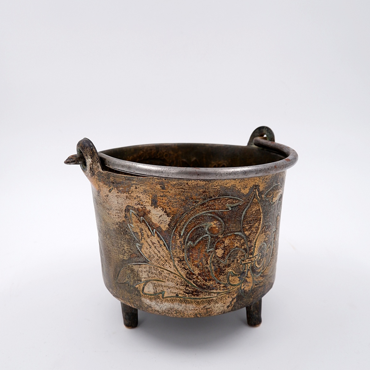 Small embossed copper cauldron with the 