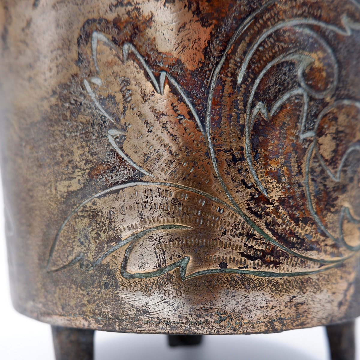 Small embossed copper cauldron with the 