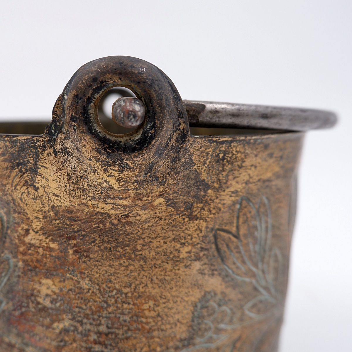 Small embossed copper cauldron with the 