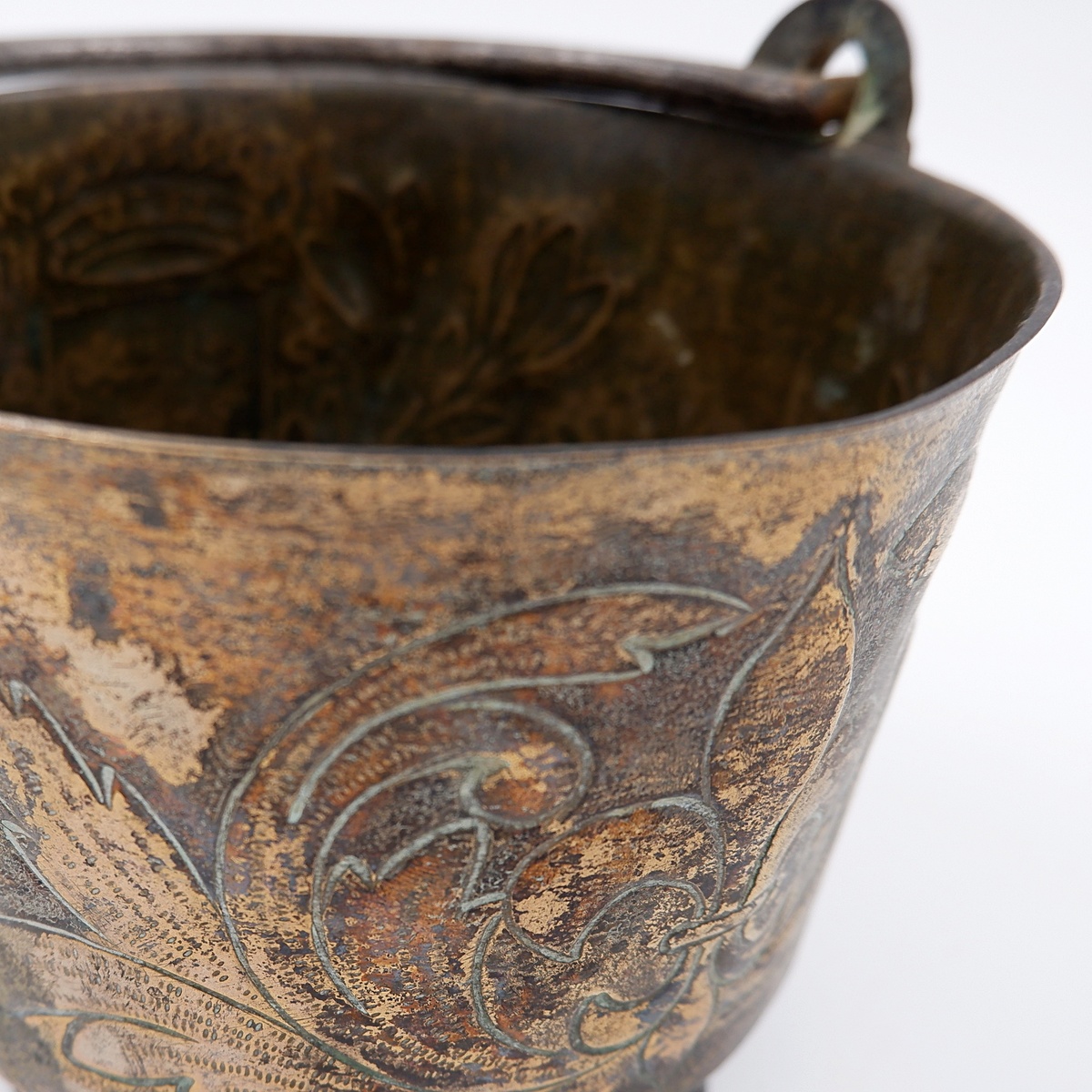 Small embossed copper cauldron with the 