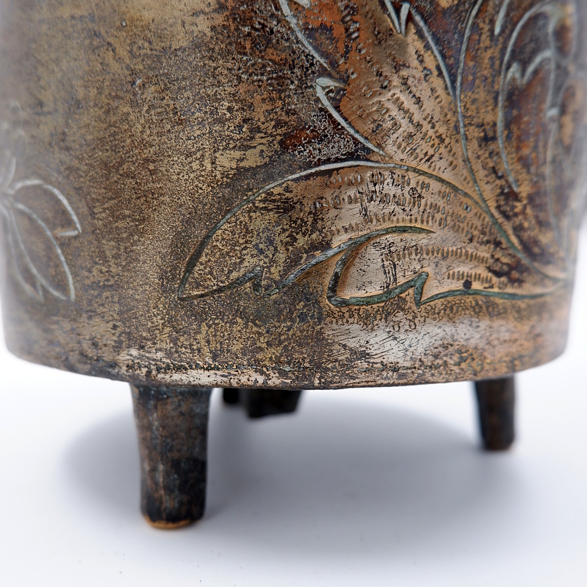 Small embossed copper cauldron with the 