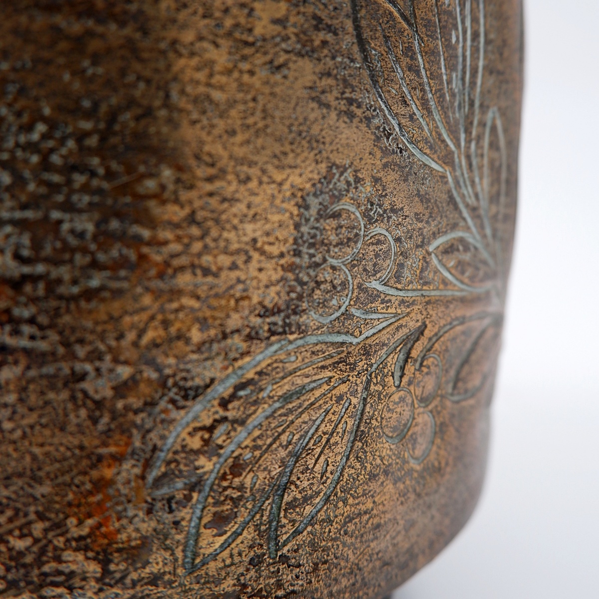 Small embossed copper cauldron with the 