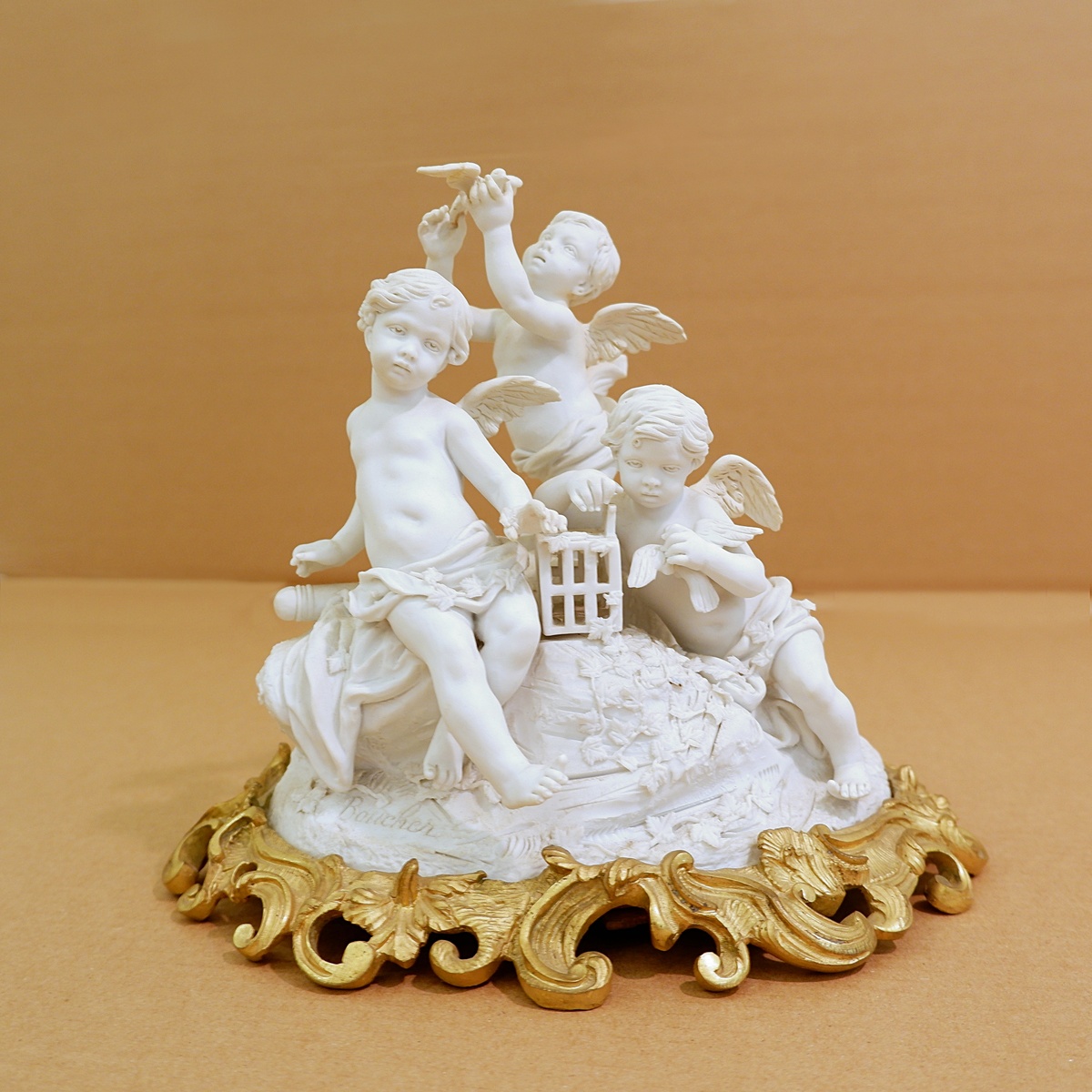 Three cherubs  in white porcelain biscuit 19th