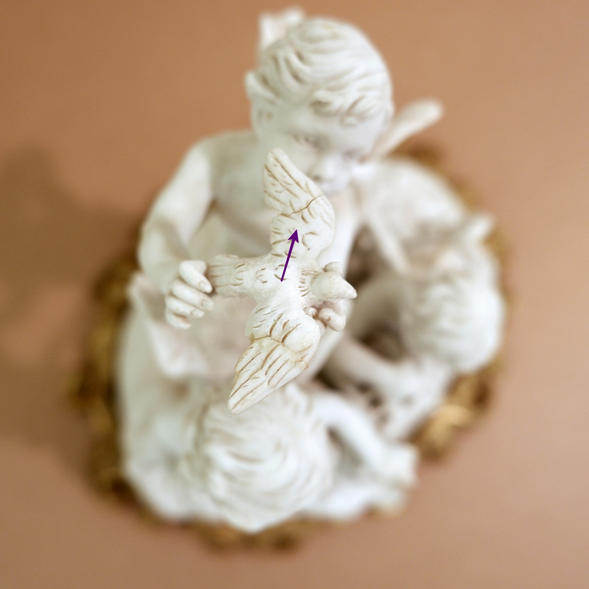 Three cherubs  in white porcelain biscuit 19th